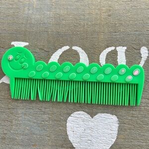 4/$100 AVON 1980 kid Green Caterpillar Comb